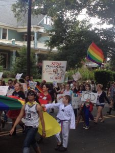 Youth from NC HEAT, iNSIDEoUT and various high schools throughout the triangle march together in the NC Pride parade.
